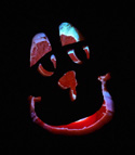 Pumpkin Carving Spooky Blue Grin by Caitlin